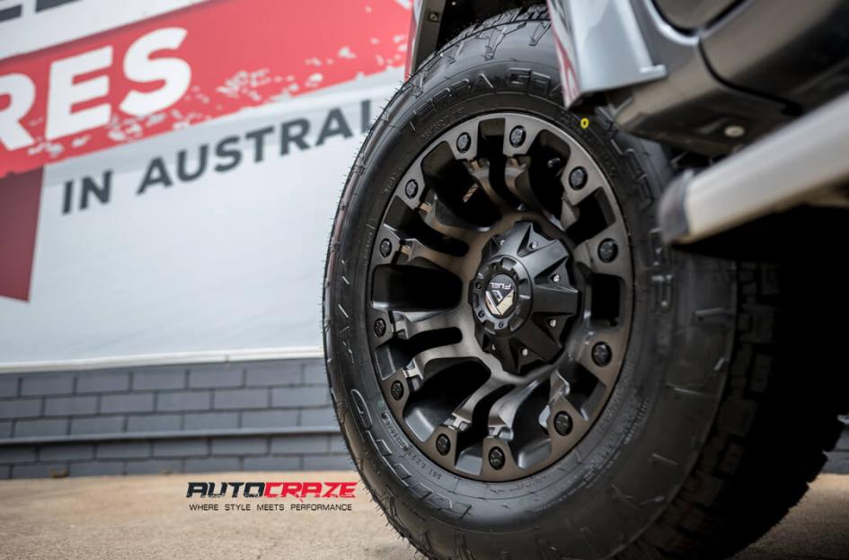MITSUBISHI TRITON VAPOR BLACK MACHINED WITH DARK TINT